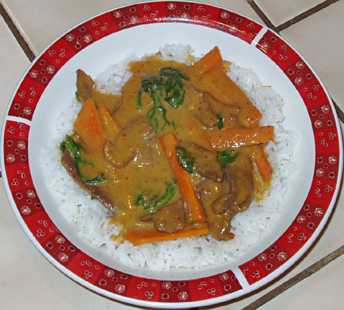 Curried beef with vegetables on rice